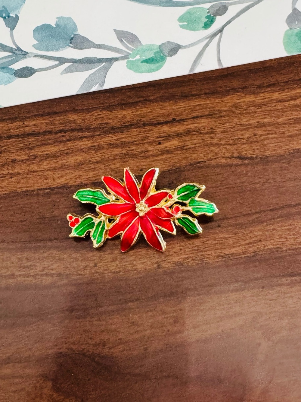 Red Poinsettia Enamel Brooch with Green Leaves